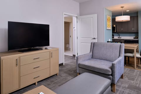 Suite, 1 Bedroom, Non Smoking | Living area | 54-inch flat-screen TV with satellite channels, MP3 dock