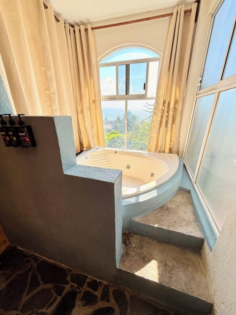 Premium Suite Ocean View | Bathroom | Shower, rainfall showerhead