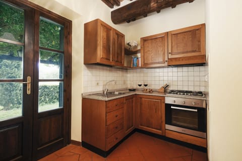 Apartment, 2 Bedrooms (I Cipressi) | Private kitchen | Fridge, oven, stovetop, electric kettle