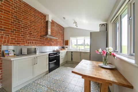 Lovely, bright kitchen with microwave and oven