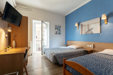 Superior Triple Room | Premium bedding, desk, laptop workspace, blackout drapes