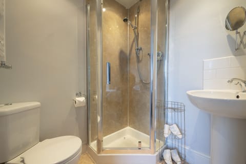 Shower, free toiletries, hair dryer, towels