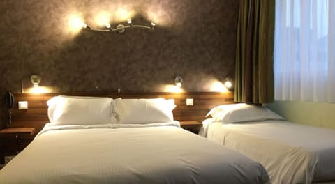 Quadruple Room | Premium bedding, individually decorated, desk, soundproofing