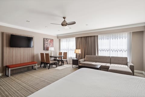 Suite, 1 King Bed | In-room safe, desk, laptop workspace, iron/ironing board