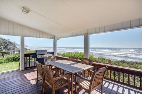 Enjoy grilling and dining with a view of the Pacific from the covered porch.