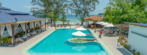 Outdoor pool, open 7:00 AM to 10:00 PM, free cabanas, pool umbrellas