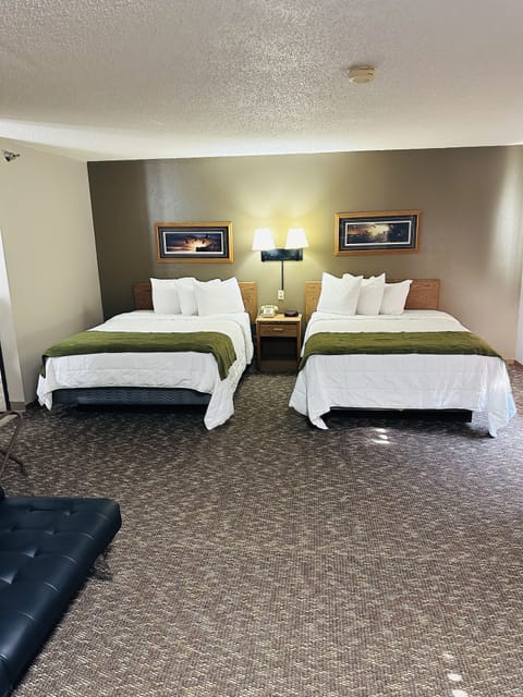 Standard Room, 2 Queen Beds | Iron/ironing board, free WiFi, bed sheets