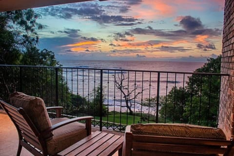 Enjoy breathtaking ocean views from the balcony of this Langosta Beach apartment. Comfortable seating invites you to relax and watch the sunset over the Pacific, making it an ideal spot for a romantic getaway or a Tamarindo Costa Rica vacation.