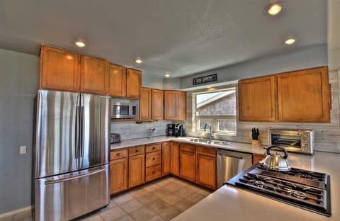 The finest in stainless steel appliances and lovely cabinetry, highlight this chef-worthy kitchen.