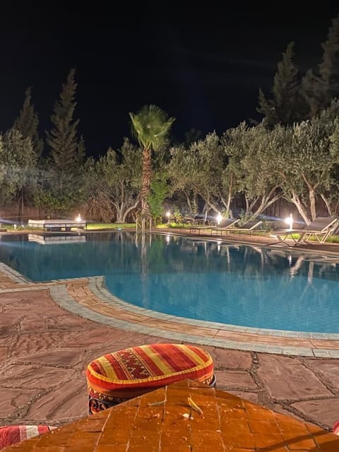 Outdoor pool, open 8 AM to midnight, pool umbrellas, sun loungers