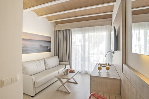 Junior Suite, Terrace, Ground Floor | Living room | TV