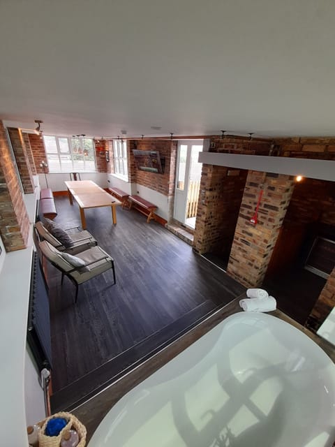 Panoramic Suite, 1 Queen Bed, Non Smoking | Living area | Flat-screen TV