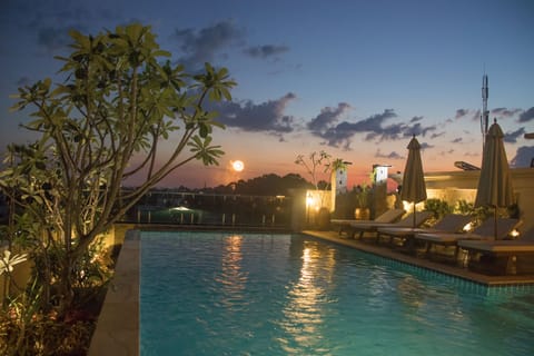Outdoor pool, open 7:00 AM to 8:00 PM, pool umbrellas, sun loungers