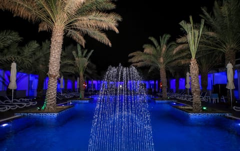 Outdoor pool, open 9:00 AM to 8 PM, pool umbrellas, sun loungers