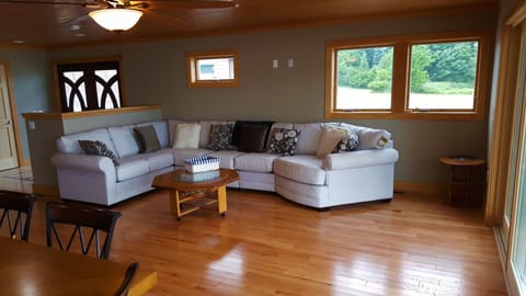 The large living room and couch provides plenty of seating for your whole family