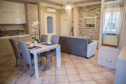 Superior Apartment, Kitchenette | Living area | TV