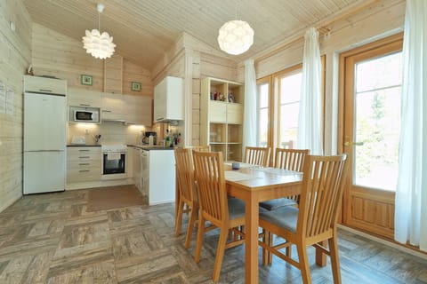 Family Villa, 2 Bedrooms, Sauna, Lakeside | Living area | 32-inch LED TV with digital channels, Smart TV, fireplace