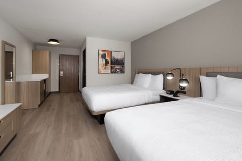 Premium bedding, pillowtop beds, desk, laptop workspace