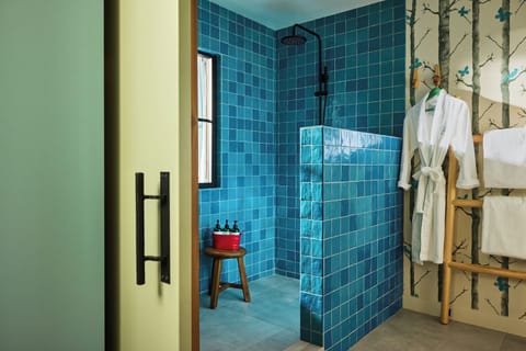 Designer toiletries, hair dryer, bathrobes, towels