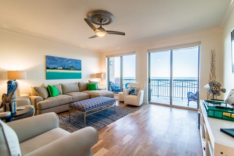 Relax in the oceanfront LR w/Balcony Access