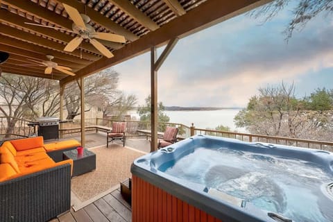 Take in a stunning view of the lake from the Hot Tub. (Please note, lake levels vary)