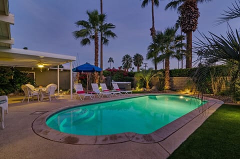 Private front yard pool with 'always hot' hot tub - evening view