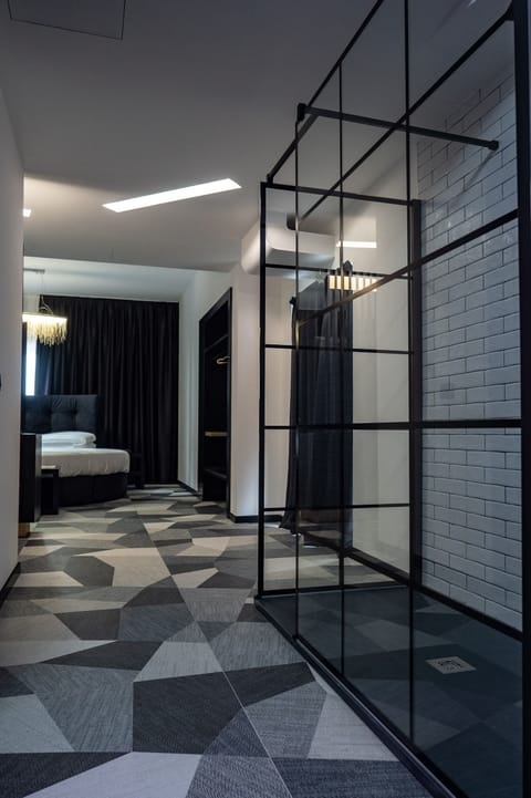 Deluxe Suite | Premium bedding, down comforters, memory foam beds, desk