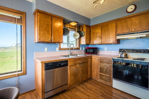 Spacious, well equipped and colorful kitchen.