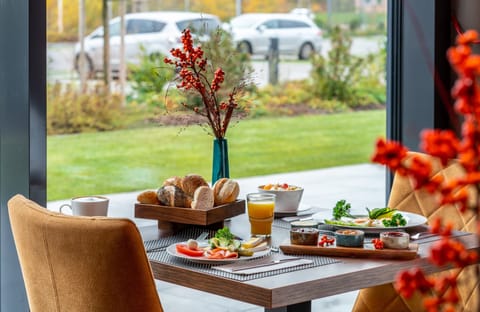 Daily buffet breakfast (EUR 18 per person)