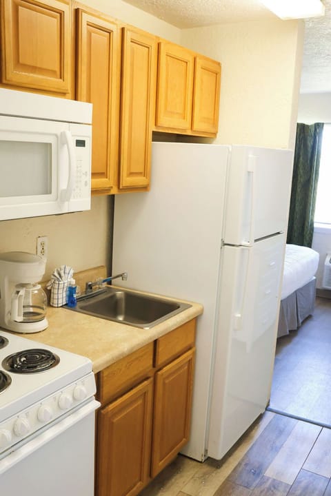 Room, 2 Queen Beds, Pets Allowed, City View | Blackout drapes, iron/ironing board, free WiFi, bed sheets