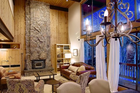 Enjoy a beverage by the fireplace and our big windows.