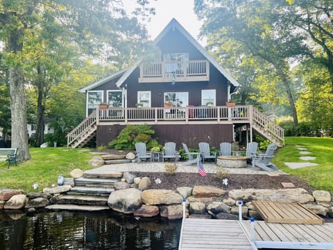 Beautiful picture from the dock shows all the new stone work, patio & Firepit