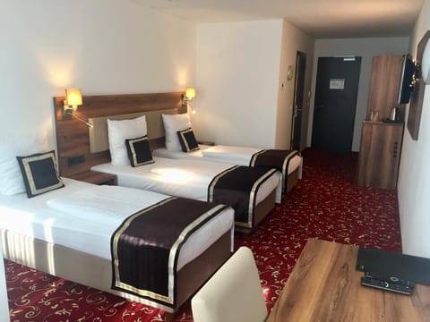 Shower, hair dryer, slippers, towels