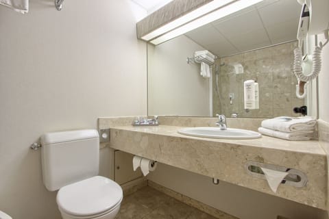 Bathtub, eco-friendly toiletries, hair dryer, bidet