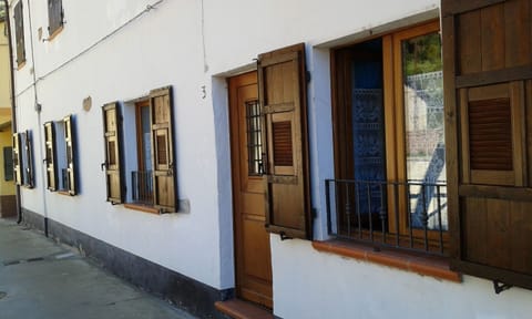 exterior with its wooden shutters.