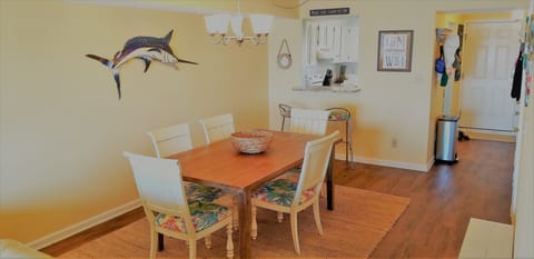Dining area with opening to kitchen
