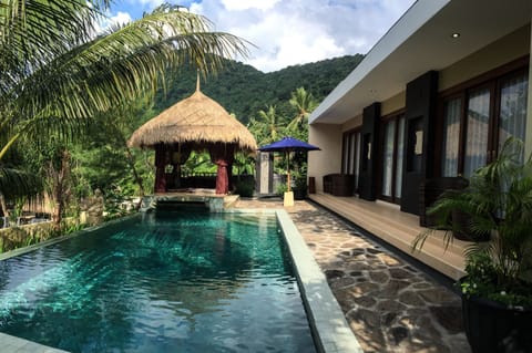 Executive Villa, 2 Bedrooms, Pool View, Poolside | Living area | Flat-screen TV