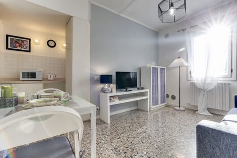 Apartment, 1 Bedroom | Living room | Flat-screen TV