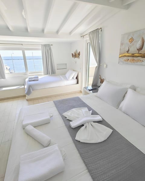 Quadruple Room, Sea View | In-room safe, iron/ironing board, free WiFi, bed sheets