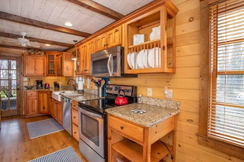 Galley Style Kitchen with Granite and Stainless
