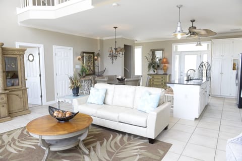 Enjoy the open floor plan of the living, kitchen, dining and a view of the Gulf!