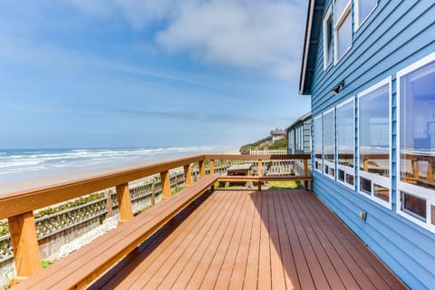 The ocean front deck and a wall of windows make this the perfect spot to vacation!