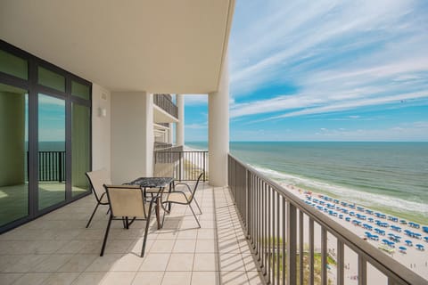 Enjoy impressive views from the balcony, overlooking the vibrant beach and azure waters