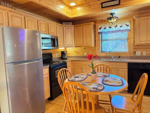 The kitchen is fully equipped for cooking ample seating for6