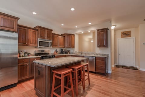 There is plenty of room in the kitchen for prepping, cooking AND serving food.