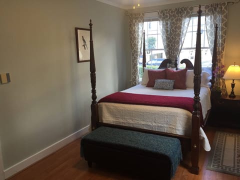 The luxurious bedroom has a comfortable queen-size bed. 