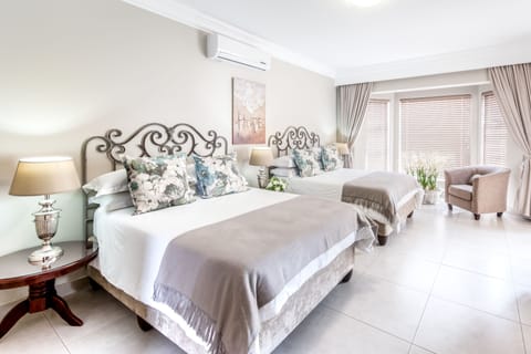 Deluxe Room (Quadruple) | In-room safe, desk, iron/ironing board, WiFi (free)