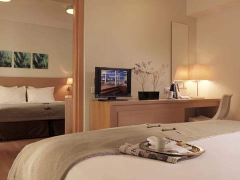 Family Room | Premium bedding, in-room safe, desk, soundproofing