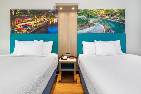 Room, 2 Queen Beds, Non Smoking | Pillowtop beds, desk, blackout drapes, iron/ironing board