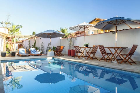 Outdoor pool, open 10:00 AM to 10:00 PM, pool umbrellas, sun loungers